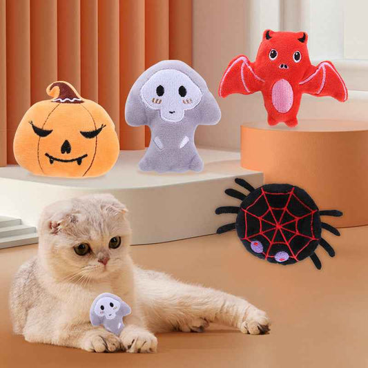 Halloween Catnip Toy set featuring plush ghost, pumpkin, bat, and spider with a playful cat. - Whiskerwise